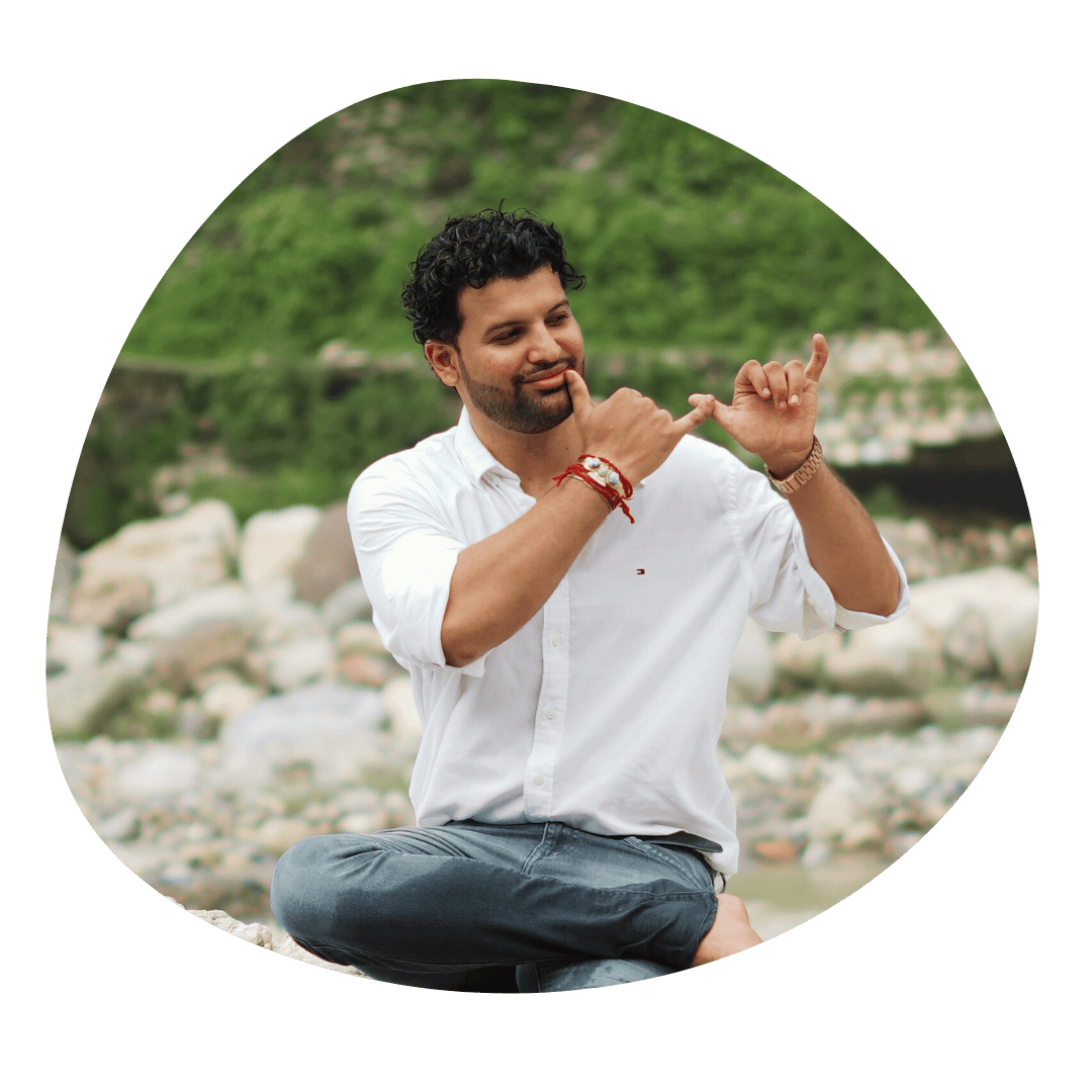 Psychic medium Daksh performing spiritual healing outdoors.